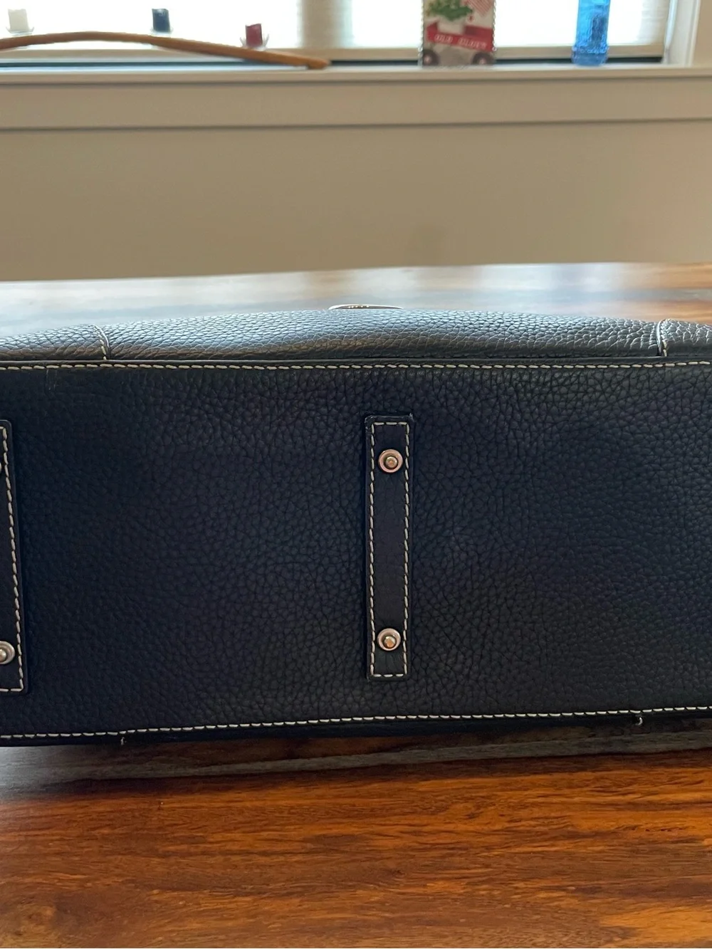 Dooney & Bourke Black Pebbled Leather Satchel with Logo Emblem
